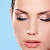 a young woman blinking